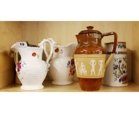 Five ceramic jugs including one Royal Doulton, tallest H. 24cm. Royal Doulton jug handle A/F.