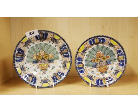 Two salt glazed pottery plates, one signed to back, largest plate Dia. 18cm. Larger plate repaired.