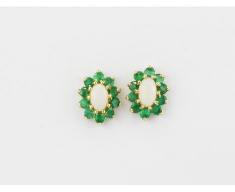 A pair of 9ct yellow gold opal and emerald set cluster earrings, L. 1cm.