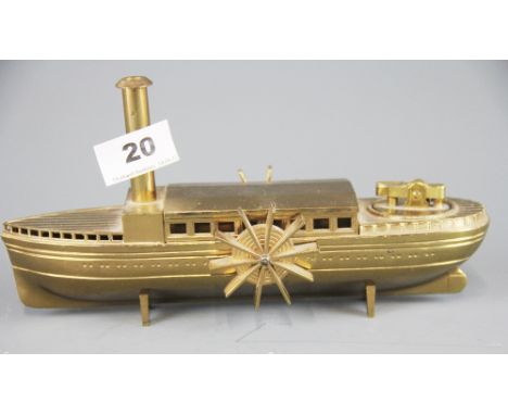 A gilt brass vintage paddle steamer table lighter, L. 24cm.