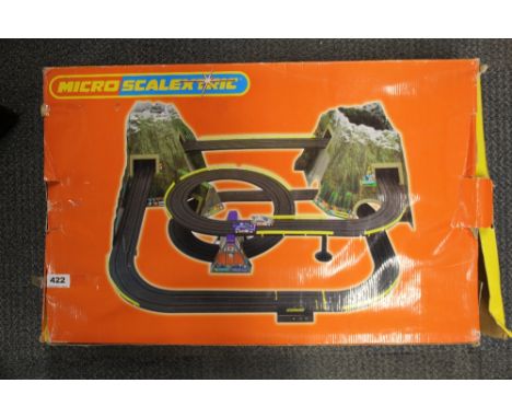 A boxed Scalextric micro set.