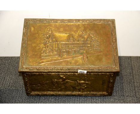 A hammered copper log box containing a quantity of vintage brass taps, etc.