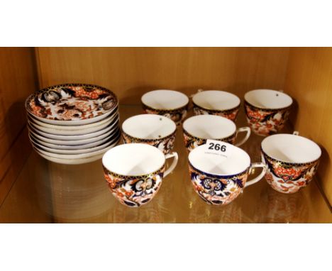 Nine early Crown Derby tea cups and saucers. Condition: generally good condition with some gilt rubbing and two cups with ear