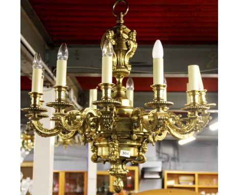 An impressive large gilt brass 12 branch chandelier light fitting, Dia. 75cm. D. 80cm. Slightly A/F.