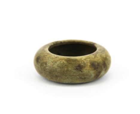 A fine 19th / 20th Century Chinese carved miniature jade / hardstone brush washing bowl, Dia. 5.5cm.