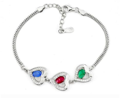 A 925 silver heart shaped bracelet set with oval cut emerald, ruby and sapphire, L. 16cm.