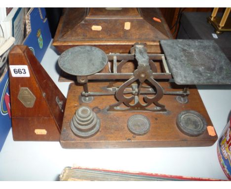 A METRONOME, and a set of postal scales and weights (2)