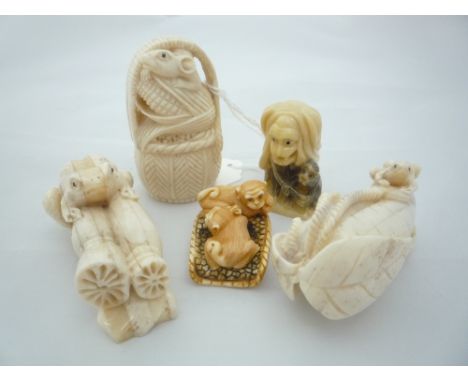 FIVE NETSUKE, all depicting animals, largest measuring 6.5cm x 3.5cm, two items signed