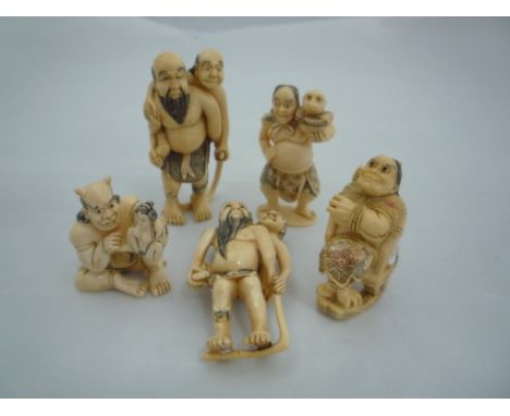 FIVE NETSUKE, all depicting demons, largest netsuke 6.5cm x 3.5cm, all signed