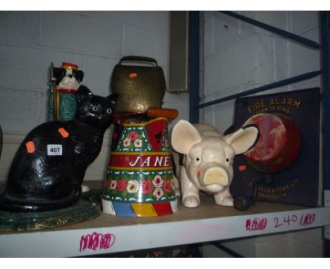 A REPRODUCTION FIRE ALARM BY BURRELLS & SONS LTD, cast doorstops, model pig, scales etc (8)