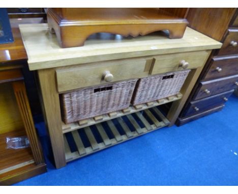 A MODERN OAK KITCHEN WORK TABLE/STATION, with two drawers, twin storage baskets and lower shelf