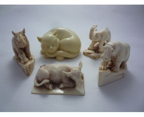 FIVE NETSUKE, to include animals, largest netsuke measuring 6.5cm x 3.5cm, rhino, elephant, hippo and buffalo signed