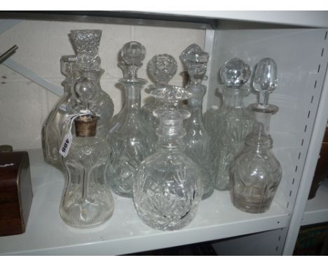 VARIOUS GLASS DECANTERS, including a silver collared decanter