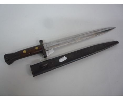 AN 1888 PATTERN BRITISH BAYONET, stamped E F D 7E 00 to scabbard, blade made by Sanderson, Sheffield, marked L.00