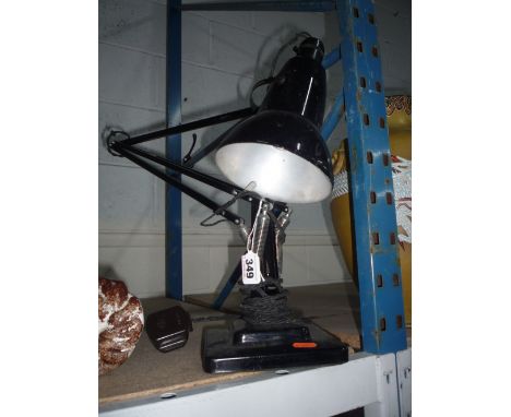 AN ANGLE POISE DESK LAMP, black