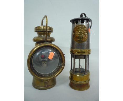 A HAILWOOD & ACKROYD LTD MINERS LAMP, together with brass signal lamp (2)