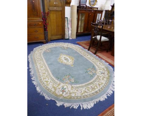 A RED AND BLACK GROUND CARPET, approximate size 275cm x 185cm