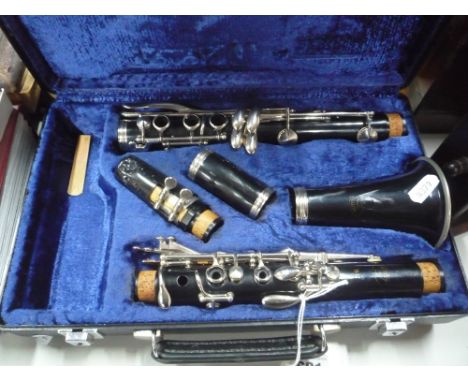 A CASED BUFFET CLARINET, and a cased Yamaha clarinet (2)