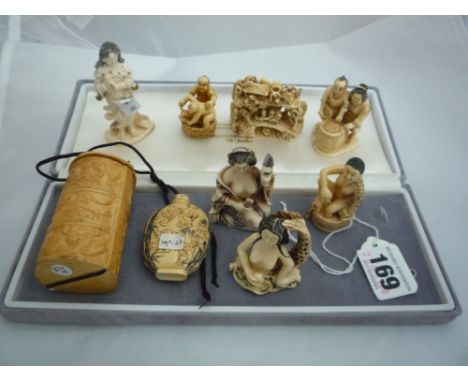 A COLLECTION OF NETSUKE, to include a scent bottle, five signed