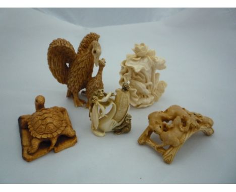 FIVE NETSUKE, depicting animals with one scent bottle, largest measuring 6x6.5cm, four signed one unsigned
