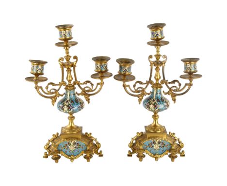 A pair of 19th century French gilt-bronze and champleve enamel table candelabra, height 31cm1 sconce is loose, otherwise all 