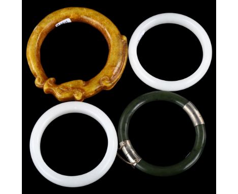 A group of Chinese jade bangles (4) 