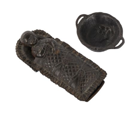 E G ZIMMERMANN - bronze match holder in the form of a baby in a crib, patent no. 12218, length 12cm, and a small bronze baske