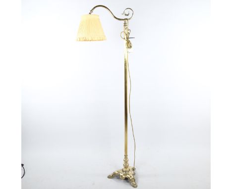 A Victorian polished brass standard lamp on heavy cast-brass platform base, recently re-wired, height 170cm (5'7")All in very