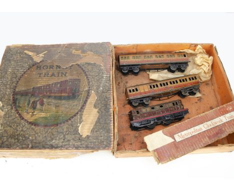 An early Hornby 0 Gauge clockwork 'Metropolitan' Train, in original set box, the locomotive with early 'control'-fitted mecha