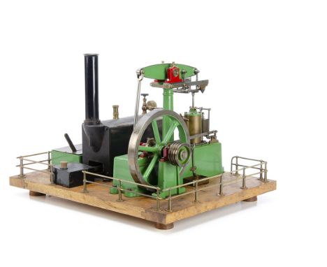 A complete Stuart Turner spirit-fired operating Steam Beam Engine, mounted on a wooden plinth with a 9" long Stuart boiler, w