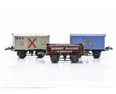 Three less-common Hornby 0 Gauge 4-wheel Wagons, all on 'T3' bases, comprising a GW light grey Gunpowder van with smaller gol