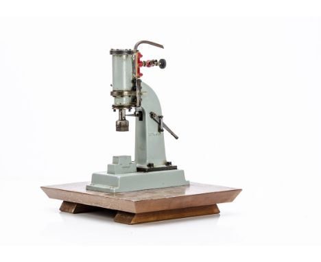 A complete Stuart Turner operating model Steam Hammer, standing approx 11" high and mounted on a hardwood plinth, the operati