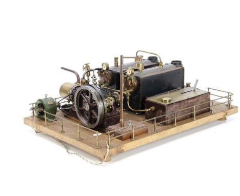 A complete Stuart Turner spirit-fired operating Steam Horizontal Mill Engine and Generator,  mounted on a wooden plinth with 