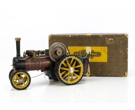 An Uncommon Vintage Bassett-Lowke Live Steam Traction Engine, in original box and finished in crimson and black with red lini