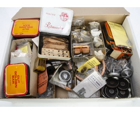 An assortment of 0 Gauge motors steam components and other Locomotive parts, various electric motors by Buhler and others, st