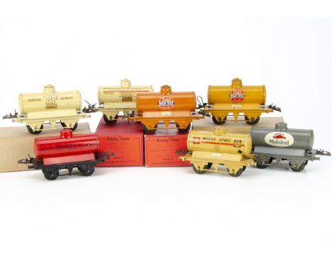 Pre- and Post-war Hornby 0 Gauge Tank Wagons, all on T3 bases, comprising cream 'Motor BP Spirit' (3), rubber-stamped red 'Sh