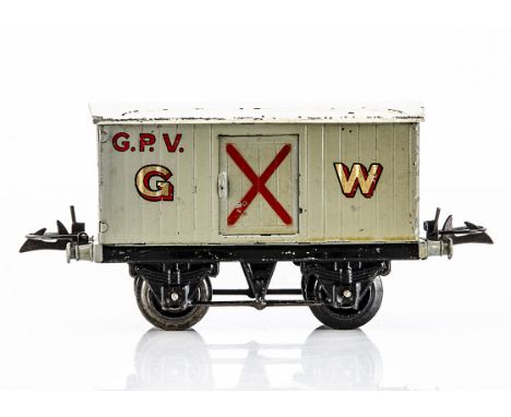 A Hornby 0 Gauge GWR Gunpowder Van, on black T3 base with axlebox slots, the body in light grey with spray-masked 'X' to slid