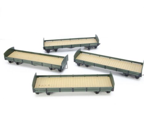 Nine Scratchbuilt/kitbuilt modified G Scale bogie low sided flat wagons with rounded ends, finished in dark green with dark c