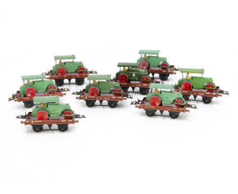 Hornby 0 Gauge Flat Wagons with Road Roller loads, a rake of 8 flat wagons (6 BR and 2 NE, all in brown), each with a Dinky T