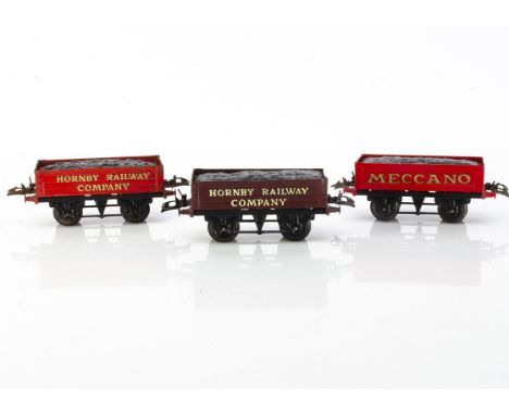 Hornby 0 Gauge 'T3-base' Coal Wagons, one 'Meccano' and one 'Hornby Railway Company' wagons in red with gold lettering, and a