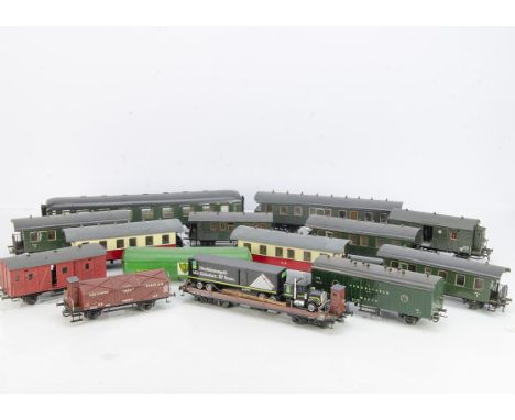 Continental 0 Gauge Rolling Stock by various makers, three German long-wheelbase 4-wheel coaches in green and generator van b