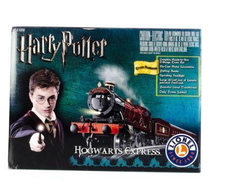 Lionel 0 Gauge Hogwarts Express Train Set,  comprising 'Hogwarts Castle' Locomotive and tender, three red Coaches with interi