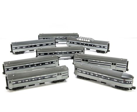 Rake of MTH 0 Gauge New York Central grey with blue and white stripes Passenger Coaches with lighting, 10590, 290, 10510, 450