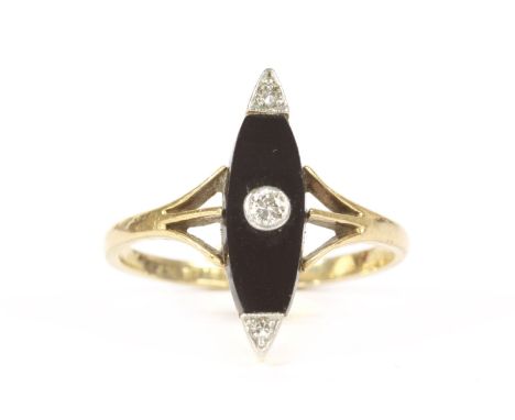 An Art Deco onyx and diamond marquise shaped plaque ring, with trifurcated shoulders, finger size N, marked 18PT3.15g