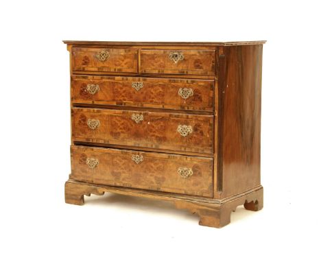 A walnut and feather banded chest, 18th century and probably later with two short and three long drawers, on bracket fee, 104