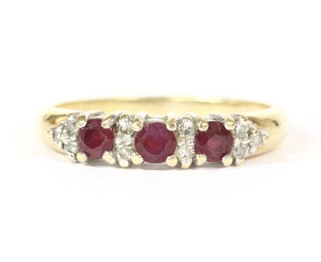 A 9ct gold circular mixed cut ruby and diamond half hoop ring,2.03g