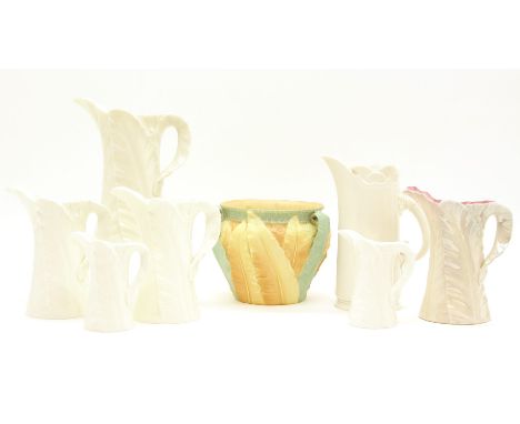 Various Royal Worcester leaf moulded jugs, with a blush ground jardiniere