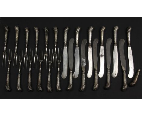 Bill Brown cutlery collection: 11 pairs of Georgian silver handled knives and forks, with shell capped pistol grip handles, e