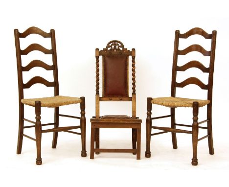 Two ladder back chairs with rush seats, together with a Victorian mahogany folding chair
