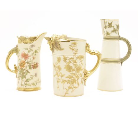 Three Royal Worcester jugs, each painted or moulded with flowers, largest 22.5cm high (3)